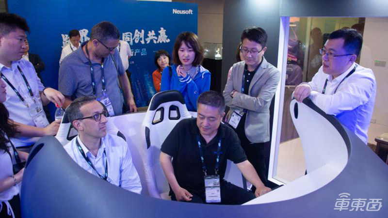 东软携手腾讯机器人发布智能出行产品 实现车机、手机、家居三端互联