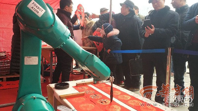 从对子狂人到书法机械臂 AI把春联玩嗨了